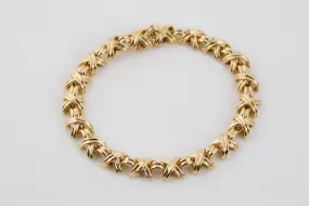 7" Tiffany & Co. 18k Yellow Gold Vintage Signature X Bracelet (28.78g.)